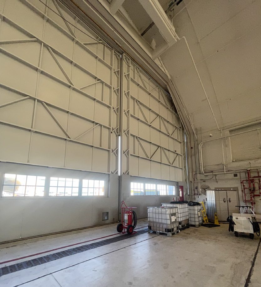 Interior of Hangar 110 with its tall hangar doors.